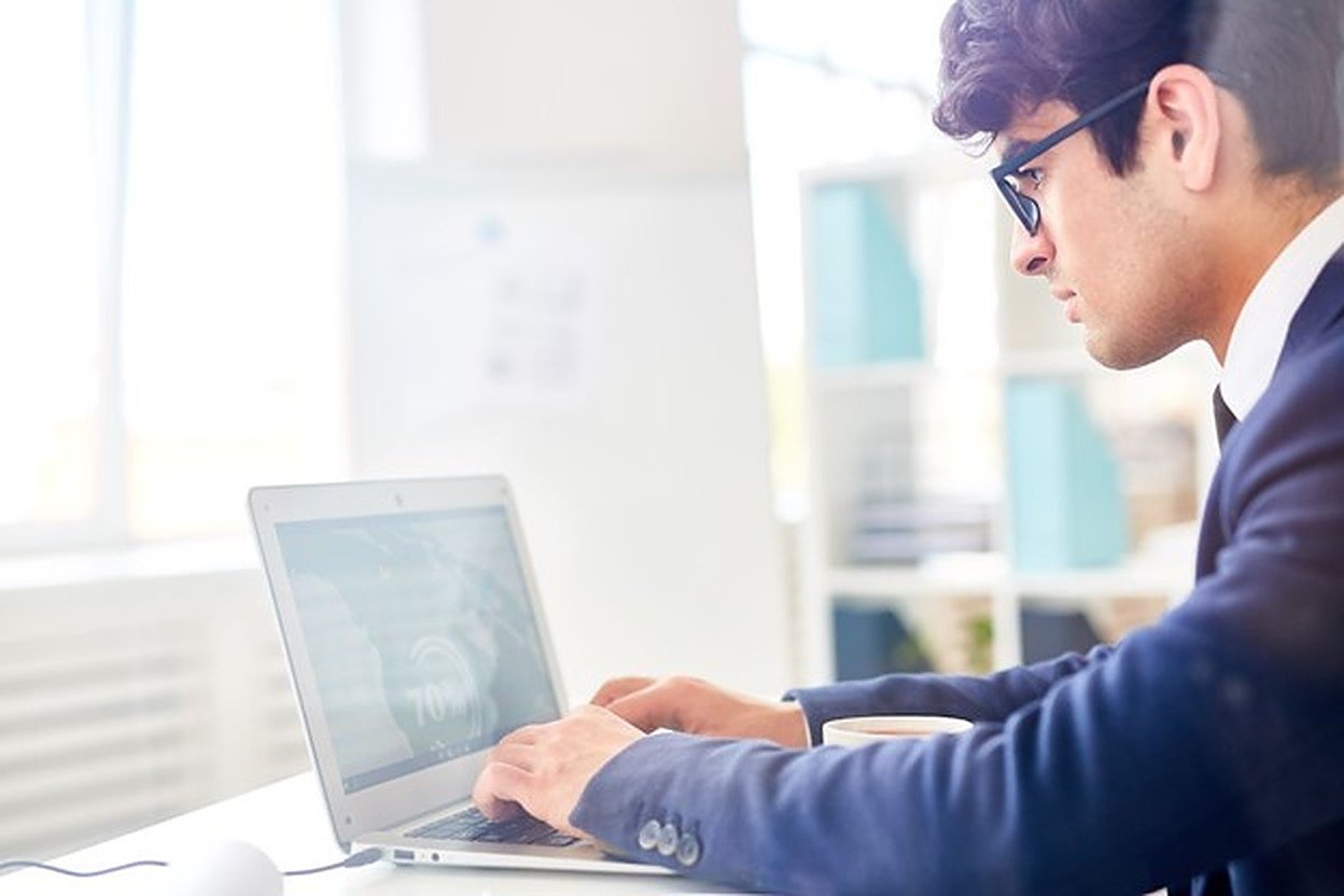 A+person+using+a+computer+(1) A+person+using+a+computer+(1)